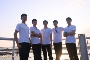 Taking a break between shows, dancers Victor Li, Ben Huang, David Xiao, Scott Xu, and Allen Liu (L-R) pose in front of the salt fields in Tainan, Taiwan. (Photo by dancer Nick Zhao)